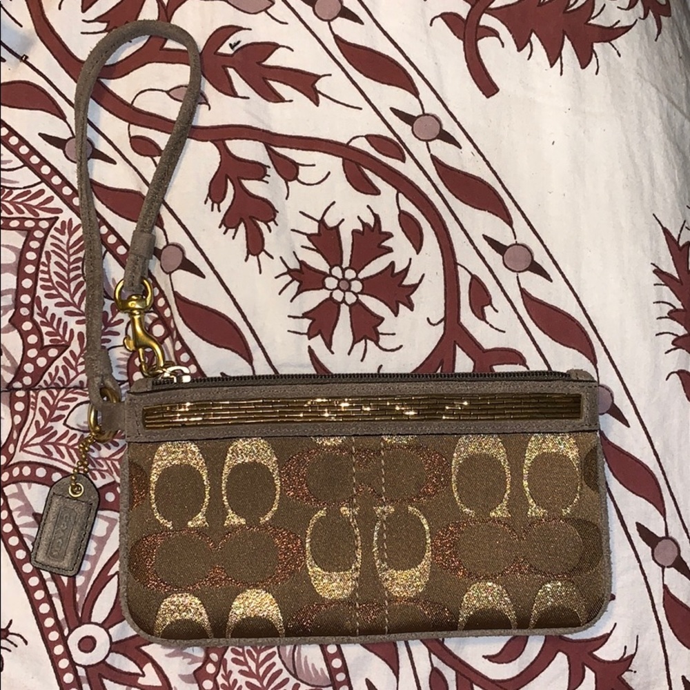 Never been used Coach wristlet